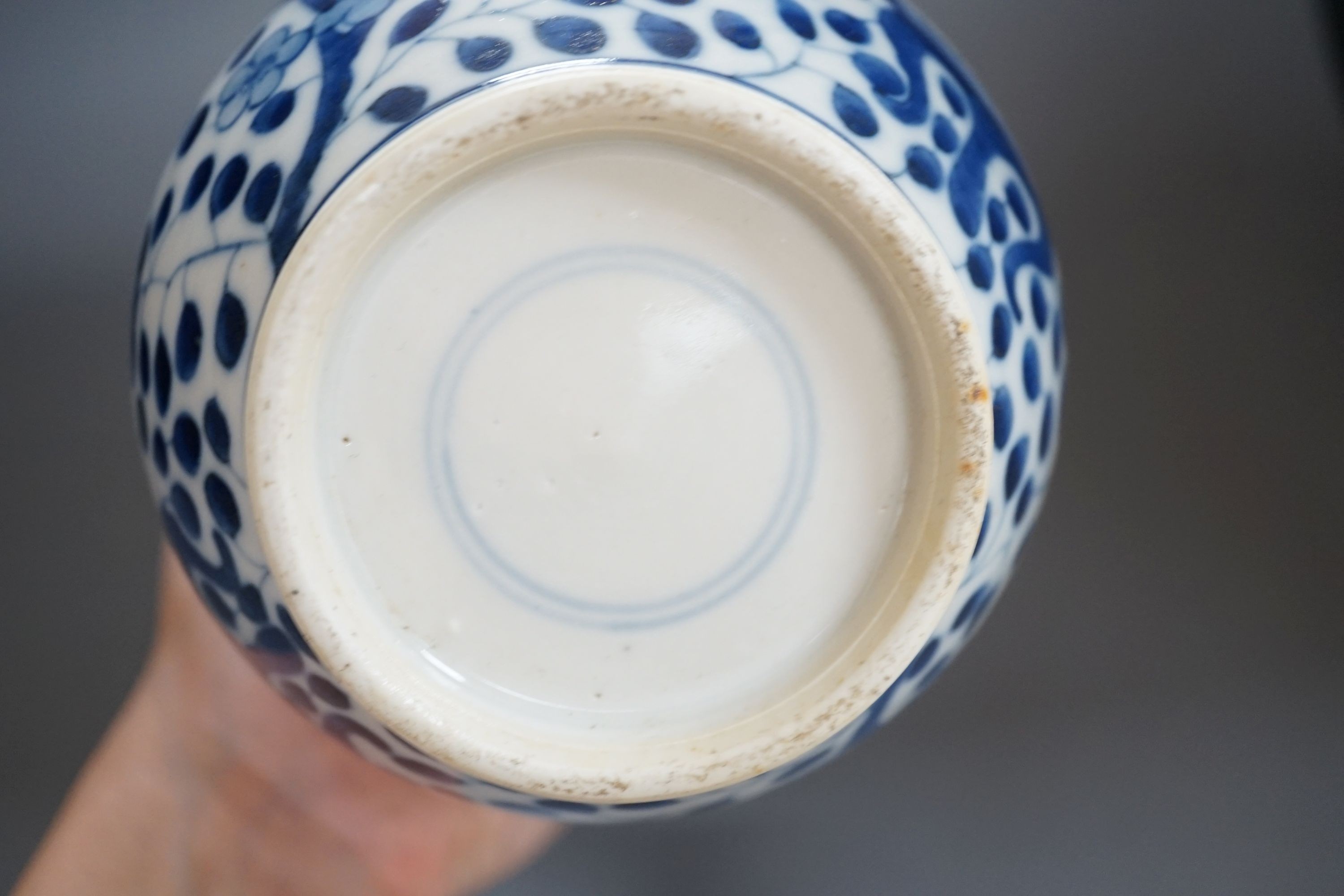 A Chinese double gourd blue and white vase, 27 cms high.